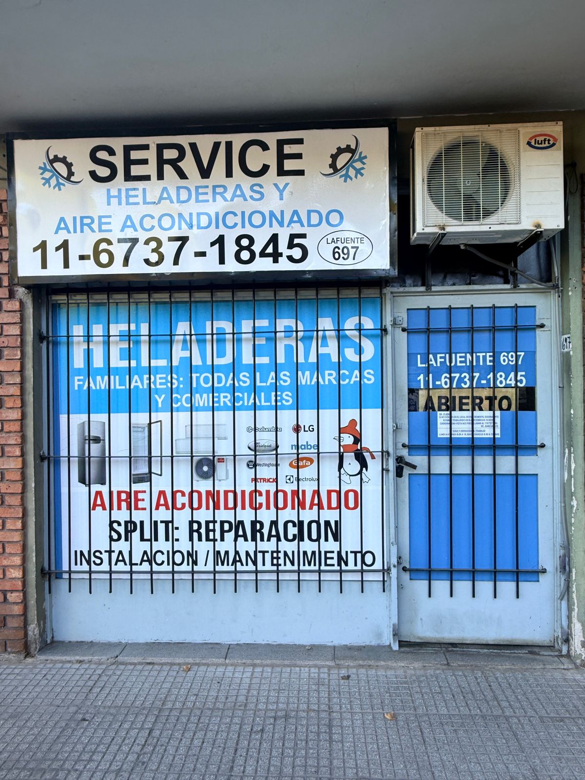Frente del local Juan Carlos San Martin e Hijo, service de refrigeración en Av Lafuente 697, Flores